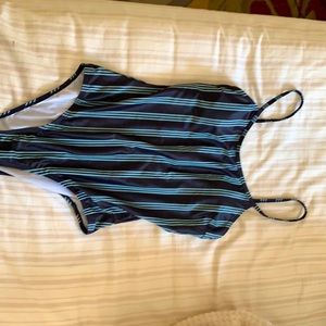 Navy and baby blue one piece. Never worn.